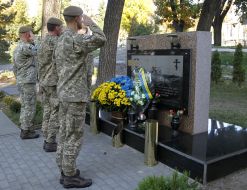Laying flowers at the monument to fallen soldiers