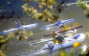 Men floating on kayaks