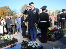 Officer near the graves of Heroes of Heavenly Hundreds