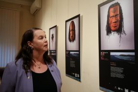 Melissa O'Rourke looks at the camera with a mask