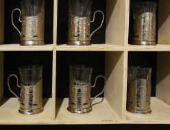 Train glasses in cup holders