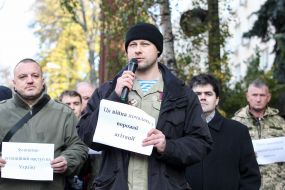 Participants hold posters