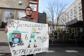 Participant hold poster