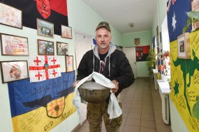 Volunteer with a cannon in his hands