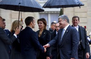 Emmanuel Macron with wife Brigita, Petro Poroshenko with his wife Marina