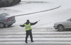 A police officer manages traffic