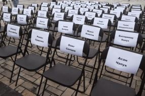 Empty chairs with names of prisoners in Russia and the Crimea and prisoners at ORDLO
