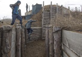 Pupils of the orphanage "Respublika Piligrim" near the trenches