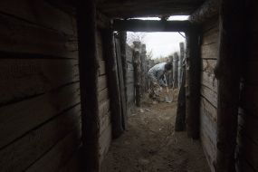 The pupil of the Orphanage "Respublika Piligrim" with a shovel strengthens the trenches