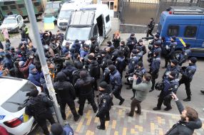 Law enforcers check activists for prohibited items