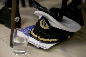 Cap and glass of water