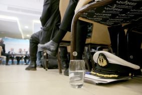 Cap and glass of water