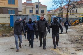 Police detain one of the participants of the fight