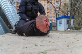 Police detain one of the participants of the fight