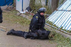 Police detain one of the participants of the fight