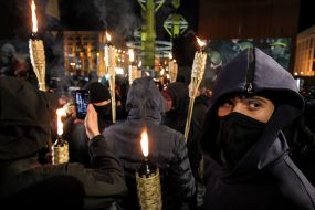 Participants of the torch-fire procession