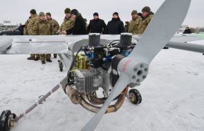 Stepan Poltorak and Petro Poroshenko inspect the drone