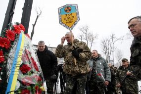 Participants in the ceremony of laying flowers