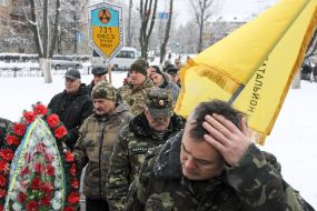 Participants in the ceremony of laying flowers
