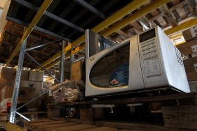 Microwave oven in the warehouse of SEATAM (OpenMarket)