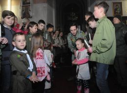 Plasta members hold the Bethlehem Fire of Peace