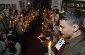 Plasta members hold the Bethlehem Fire of Peace