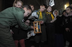 Plasta members hold the Bethlehem Fire of Peace