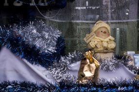 A snowman in a storefront