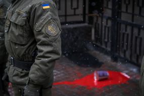 Red paint on the road near the building of the Consulate General of the Russian Federation