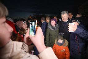 Petro Poroshenko is photographed with people