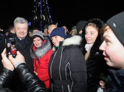 Petro Poroshenko is photographed with people