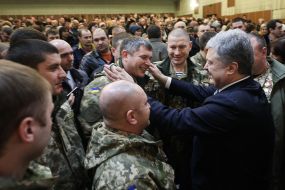 Petro Poroshenko talks to the military