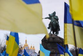 Flags of Ukraine near the monument to Bogdan Khmelnytsky