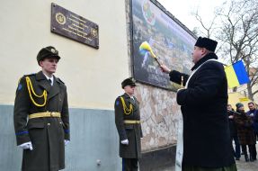 Opening a memorial plaque