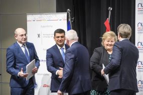 Vladimir Groisman and Erna Solberg