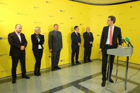 Pavel Ryabikin, Tatyana Romanovskaya and Vladimir Omelyan