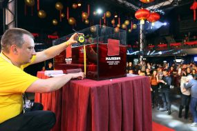 A representative of the National Record of Records records the record