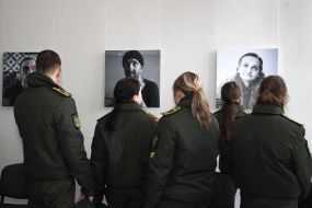 Cadets of the Academy of the State Penitentiary Service of Ukraine near photo portraits