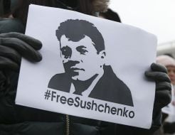 Плакат на підтримку Романа Сущенка