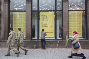 A poster in a shop window in support of Ulyana Suprun