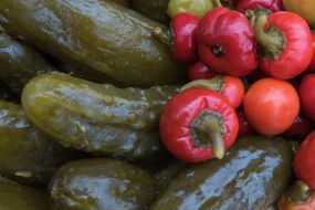 Pickled cucumbers and peppers on one of the counters