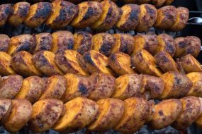 Fried potatoes on skewers
