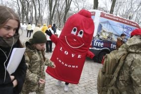 Animator dressed as a condom