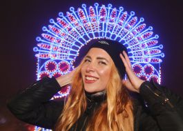 The girl next to the lantern in the form of a crown