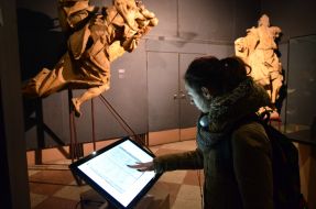 The girl next to the interactive screen