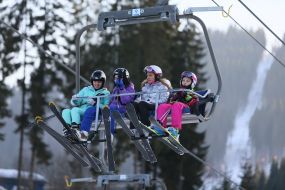 Tourists on the ski lift