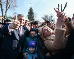 Petro Poroshenko is photographed with people in Kalush