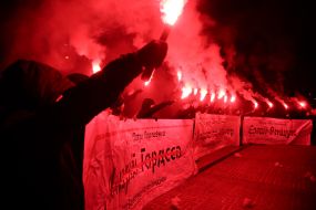 Actvists harness flares near the Court of Appeal