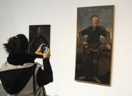 A visitor to the exhibition "Amazing Crime Stories"