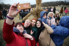 Women are photographed against the backdrop of stuffed winters